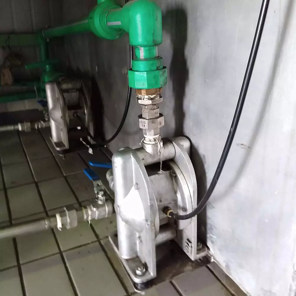 Industrial AODD pump installed in an ethyl alcohol factory